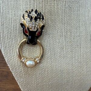 Elegant Black and Gold Panther Brooch